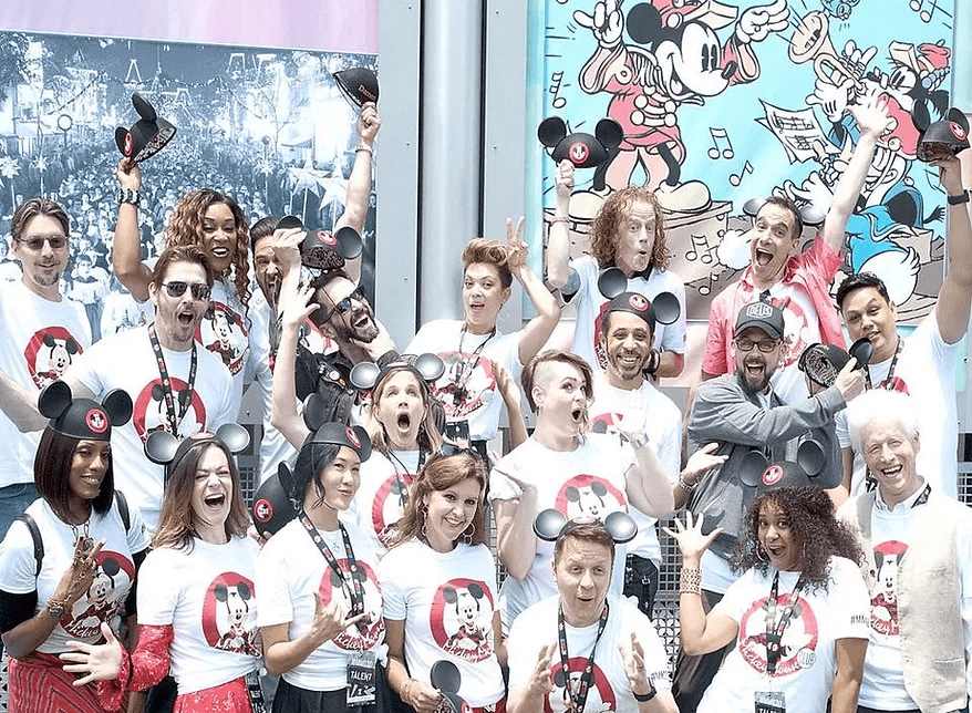 Reunited Mouseketeers wearing the limited-edition MMC30 anniversary shirt