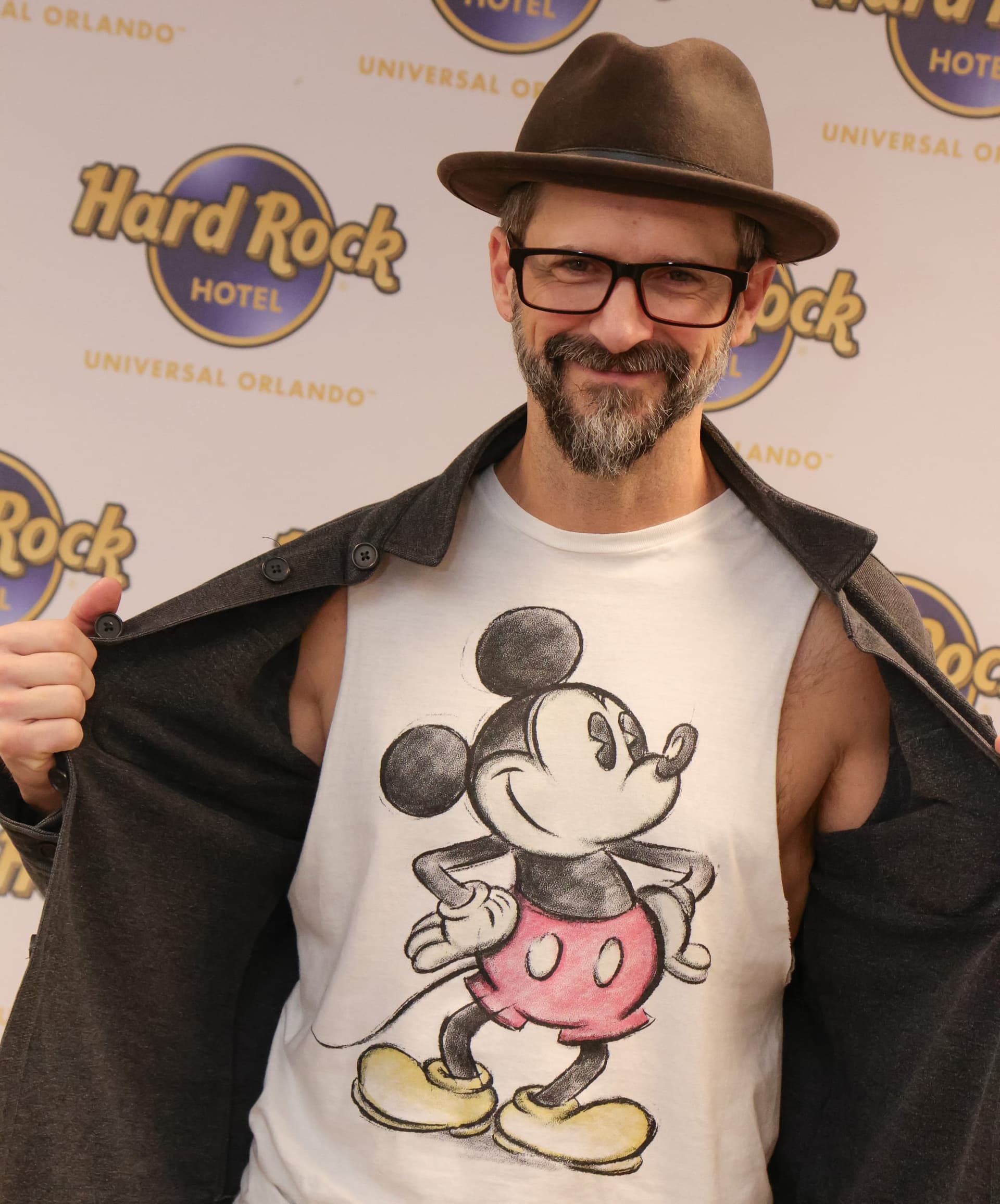 Tony Lucca showing off a Mickey Mouse t-shirt